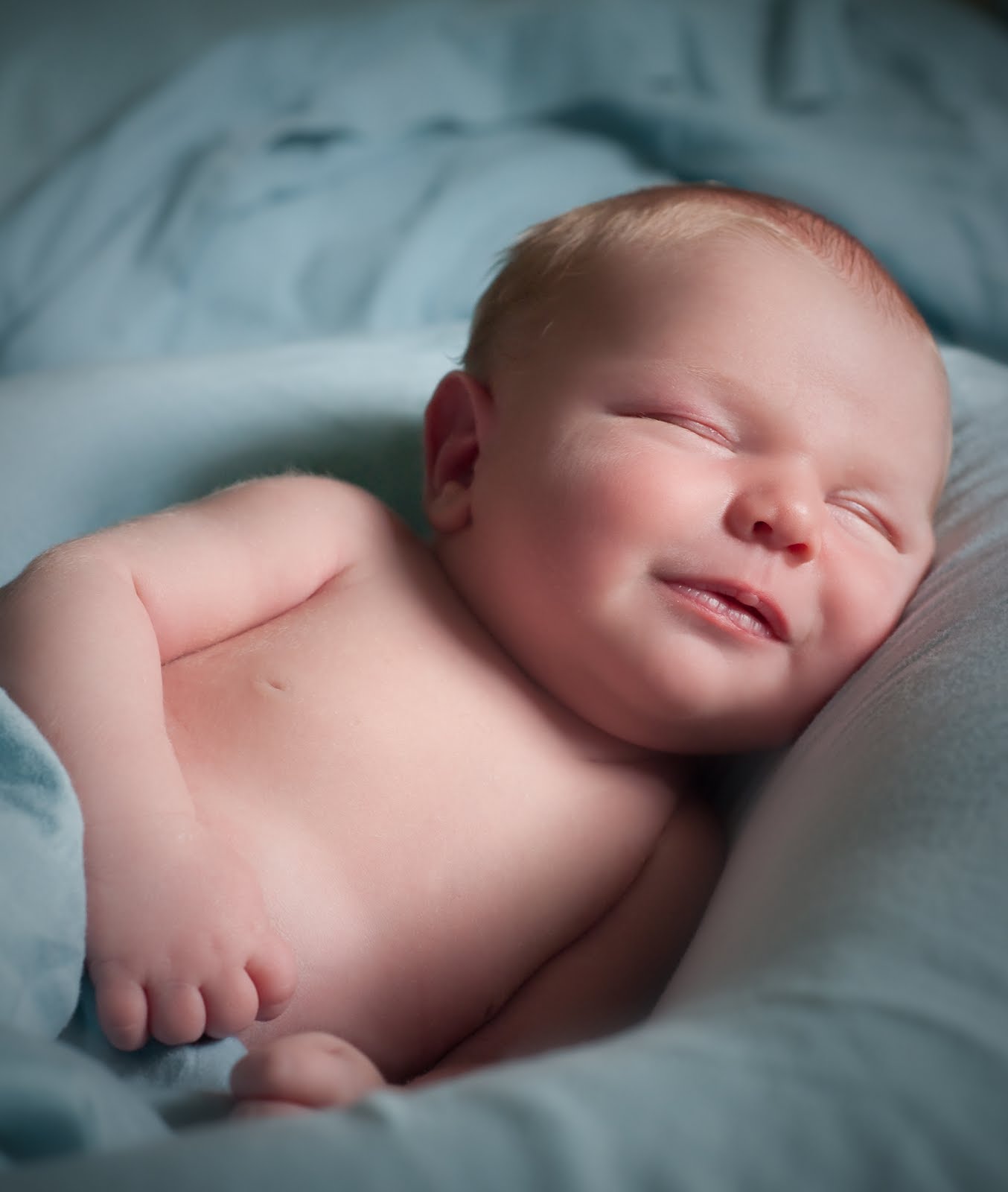 1 month old baby smiling